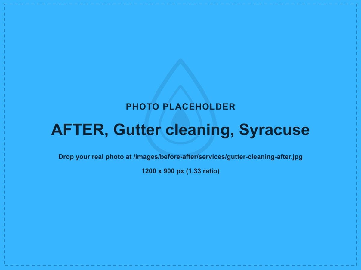 After: a clogged gutter full of leaves cleared and flushed clean